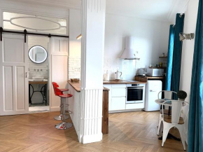 Appartement-Terrasse dans un ancien Palace Vichyssois coeur de ville